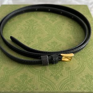 Prada skinny leather belt.